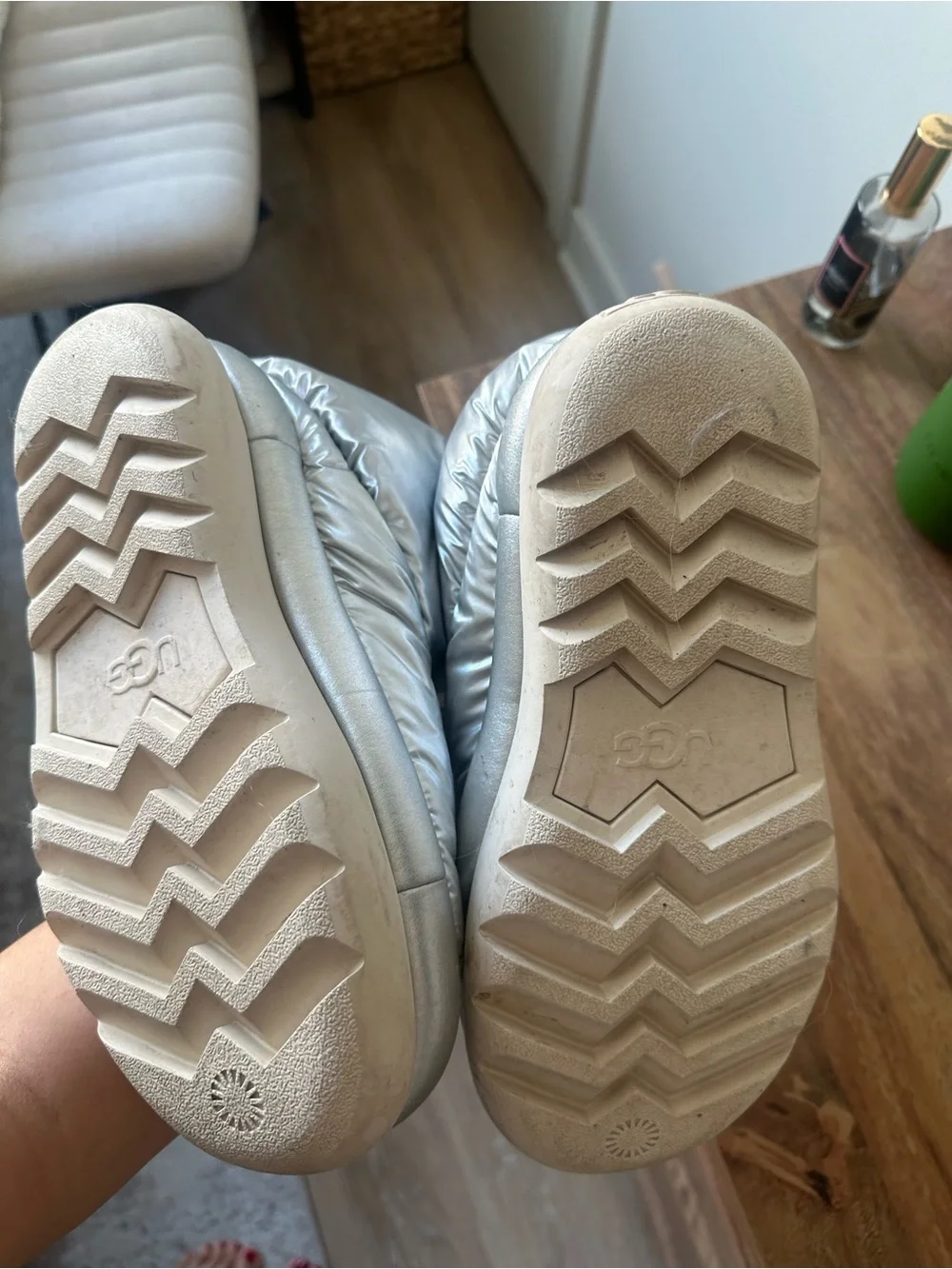 Silver Puffer Ugg boots with knotted detail